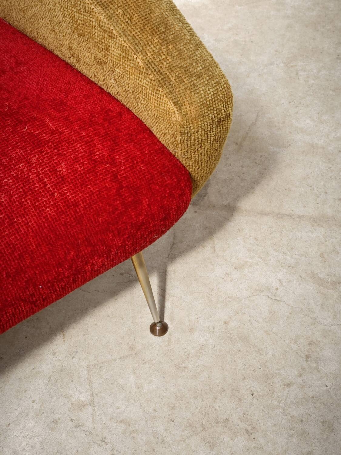 Red and mustard yellow fabric armchair in 1970s style