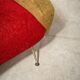 Red and mustard yellow fabric armchair in 1970s style