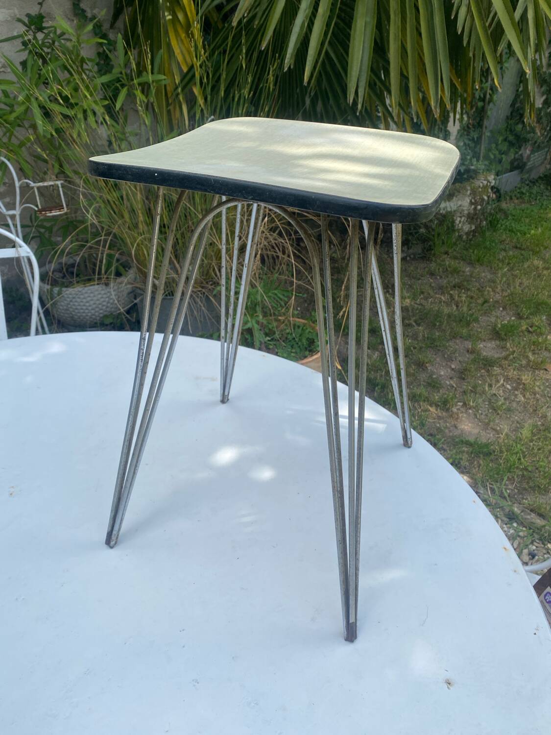 Vintage Formica stool with Eiffel legs