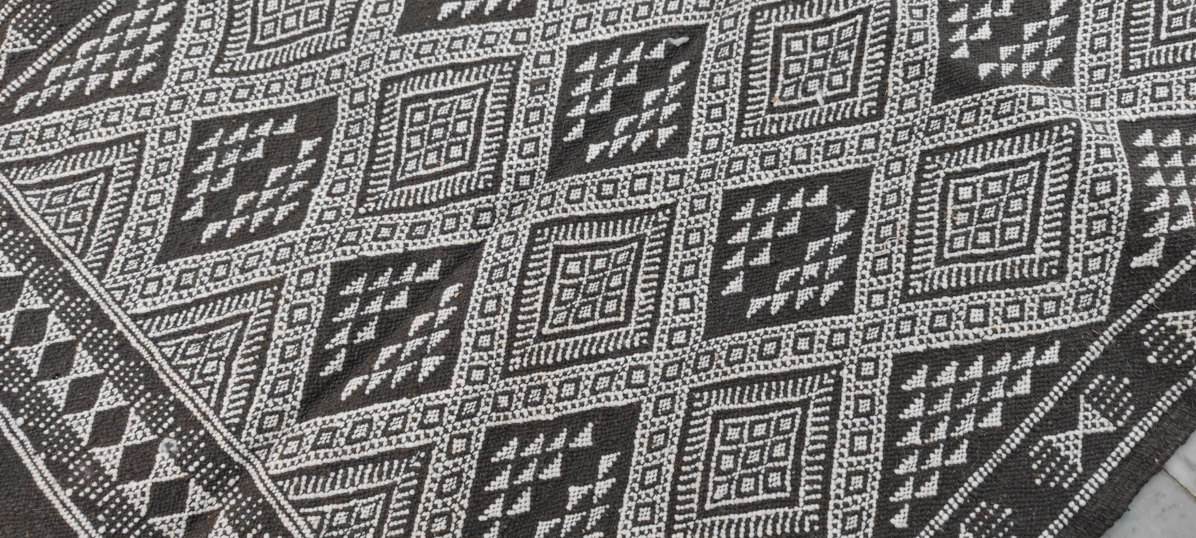 Handmade grey and white margoum carpet in natural wool