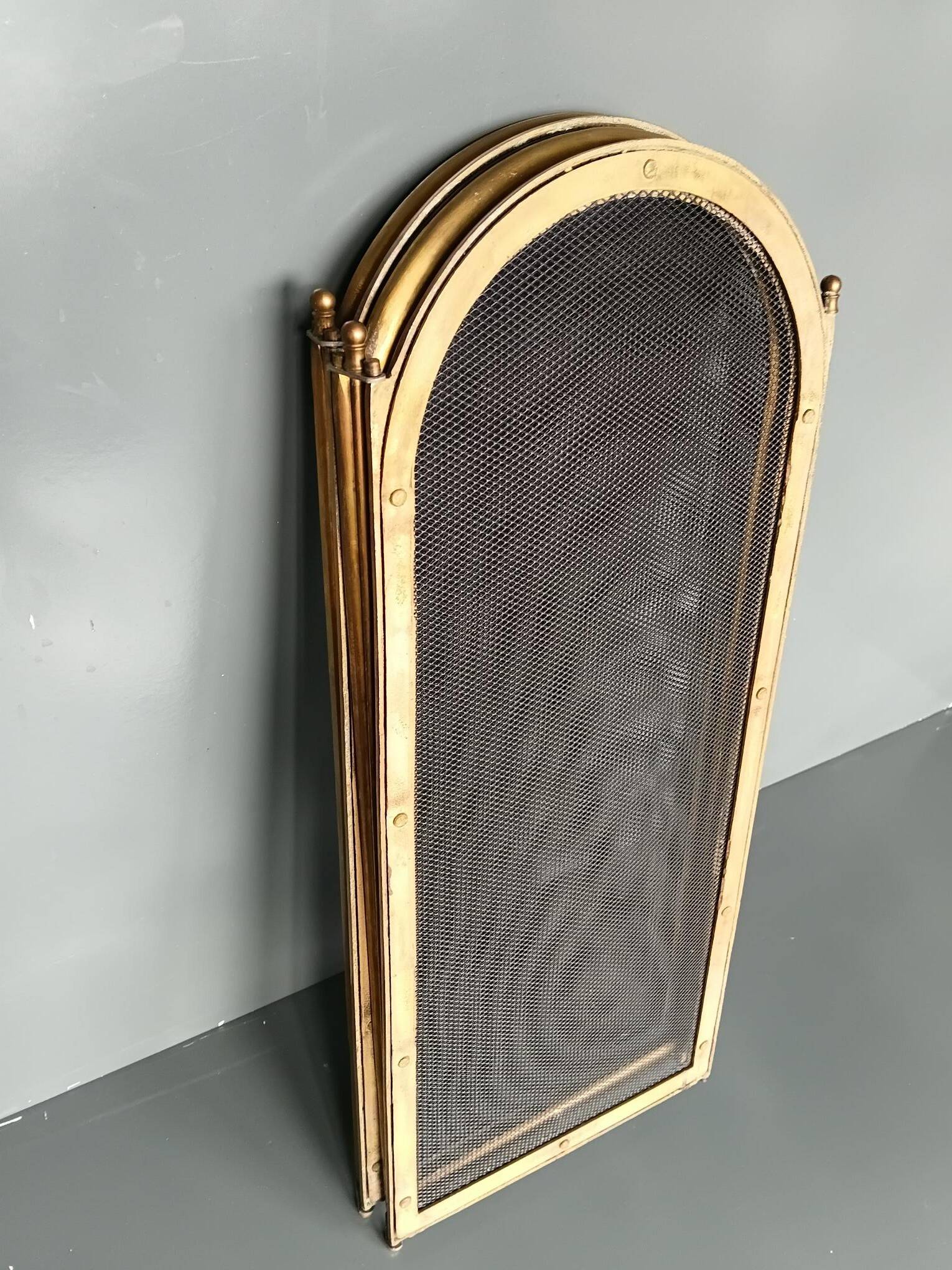 1920s brass fire screen with splash protection