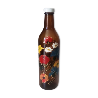 Vintage hand-painted amber glass bottle