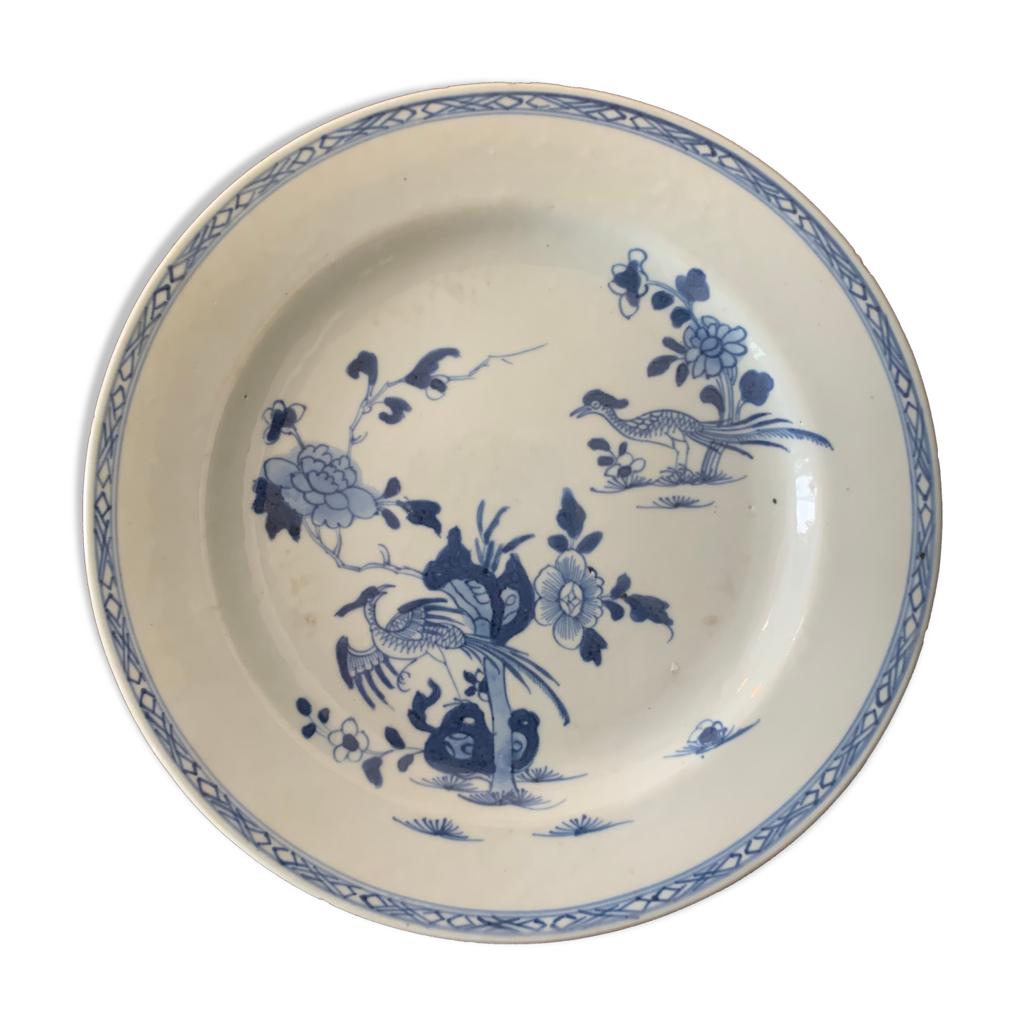 Blue and white porcelain plate of the blue family, 19th century