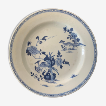 Blue and white porcelain plate of the blue family, 19th century