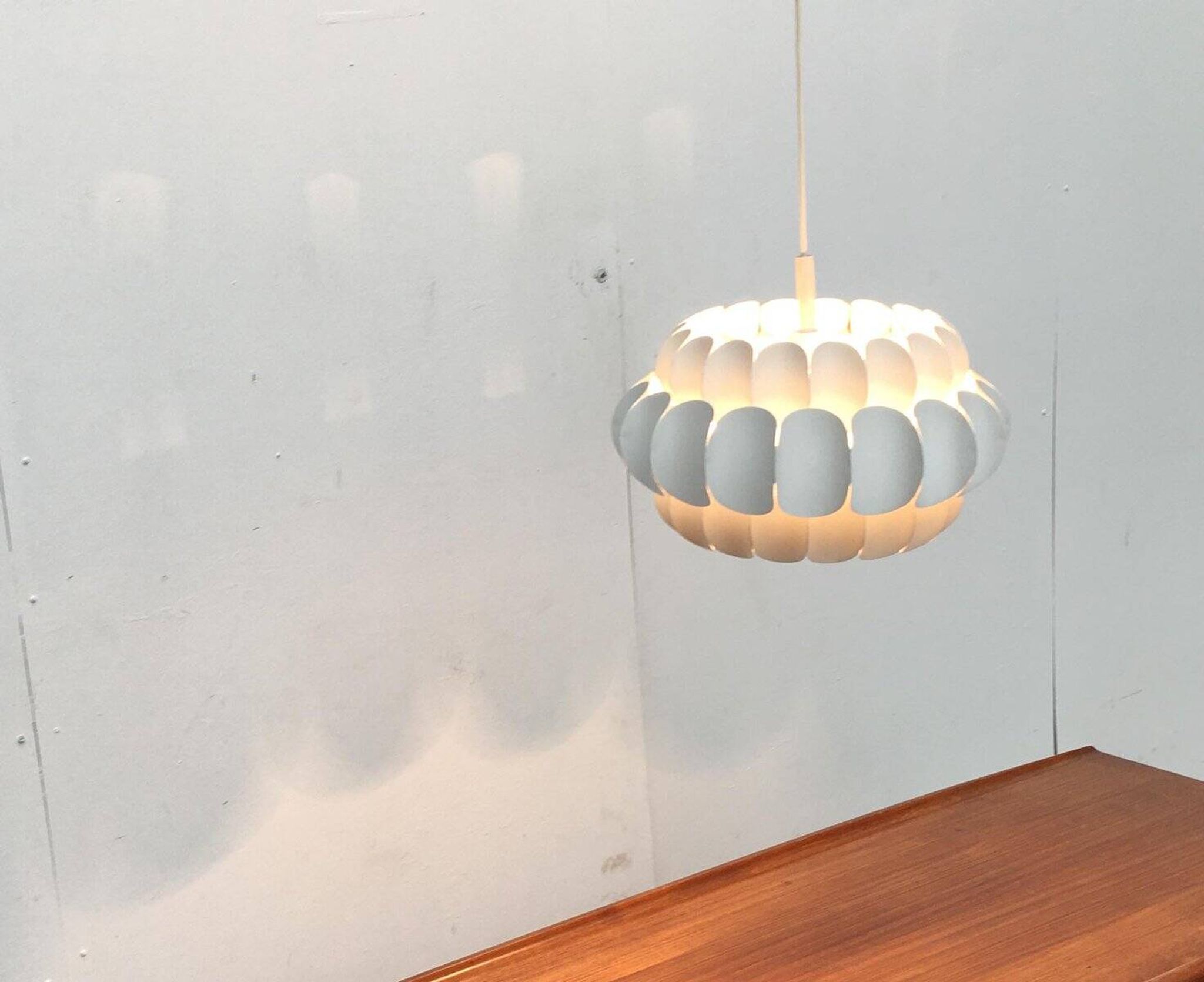 Mid-century white metal Swiss suspension by H. Zender for Temde.