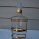 Golden liqueur service from the 1950s-1960s and its 12 glasses.