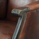 Classic vintage wingback chair in sheepskin and wood