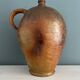 Large 19th century oil bottle in glazed earthenware