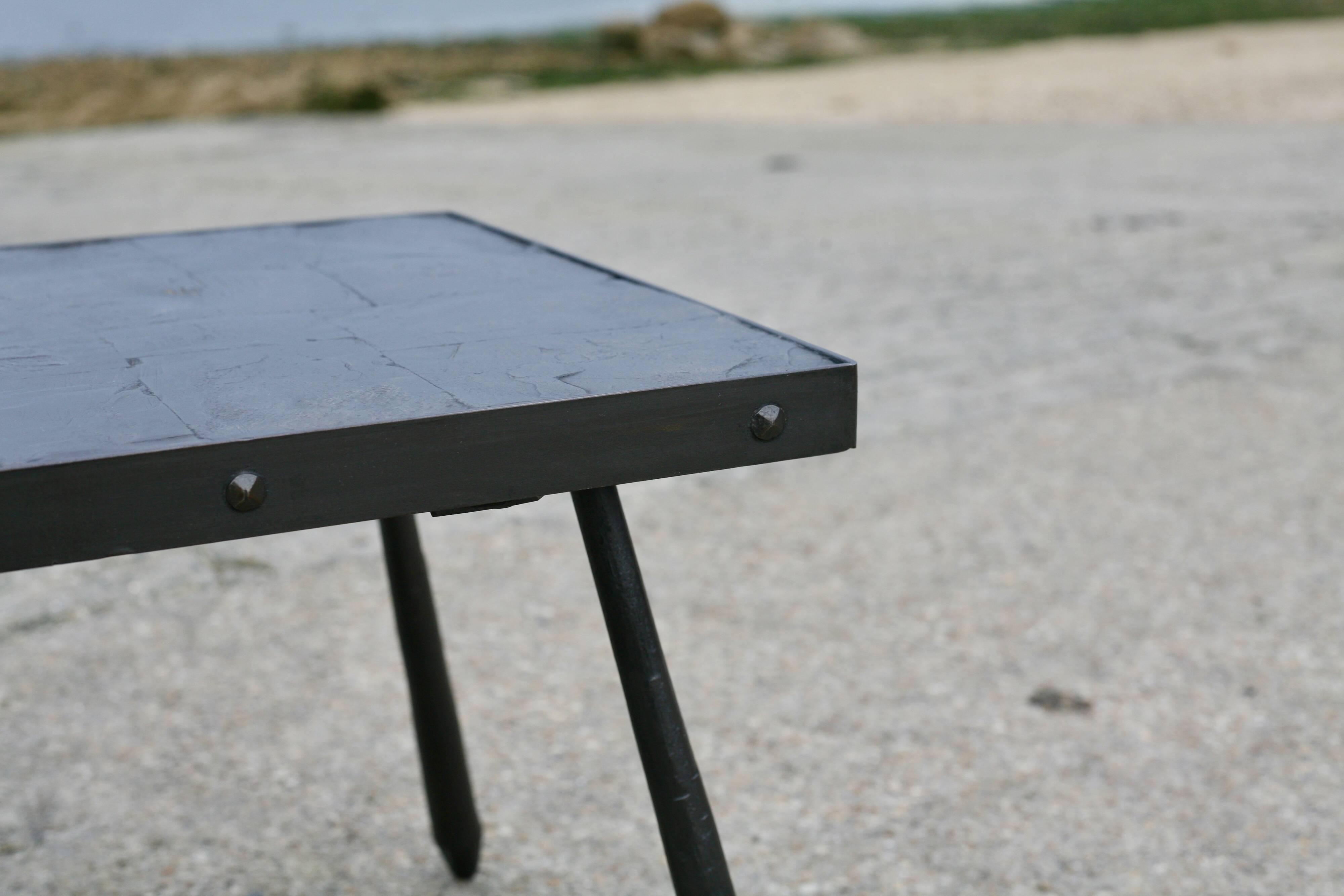 Brutalist coffee table, slate top and steel base, France, 1960s