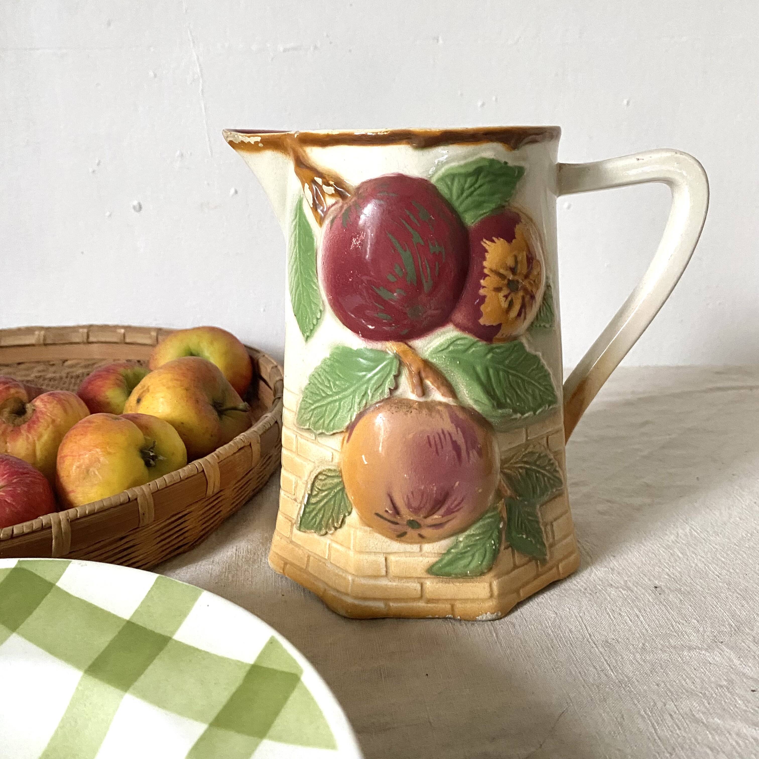 Antique pitcher in Apple slip