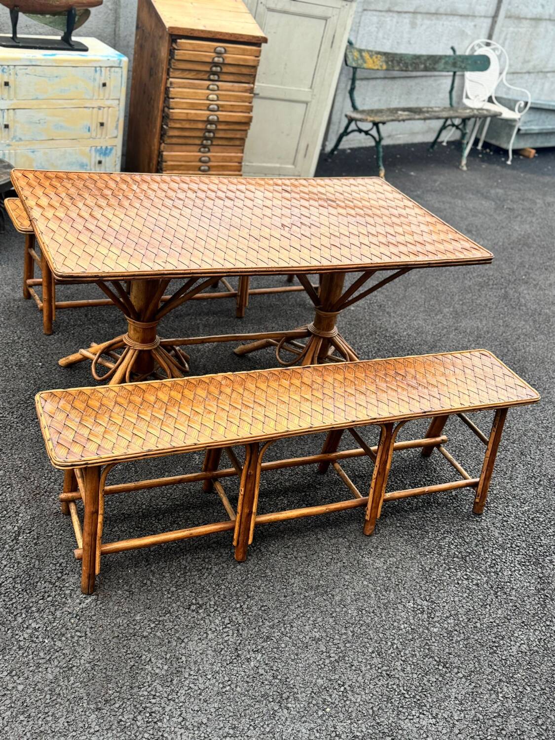 Vintage 1950s set: large table with tripod base and benches in woven chestnut