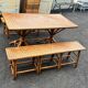 Vintage 1950s set: large table with tripod base and benches in woven chestnut