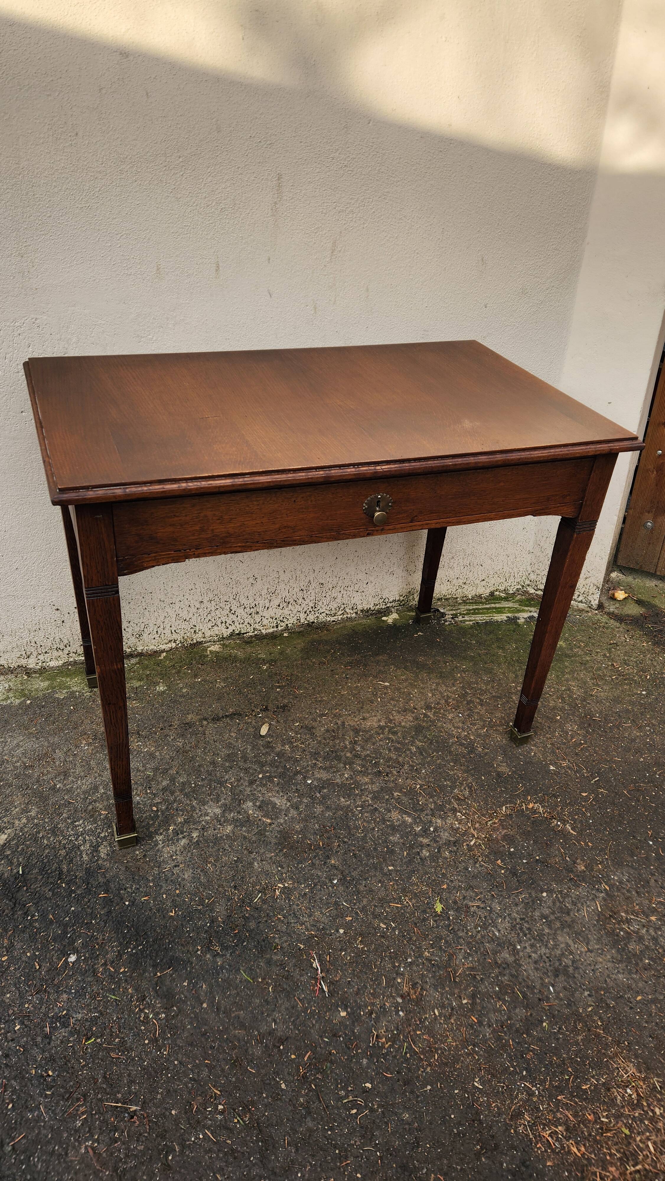 Vintage wooden desk from the 19th century, Louis XVI style.