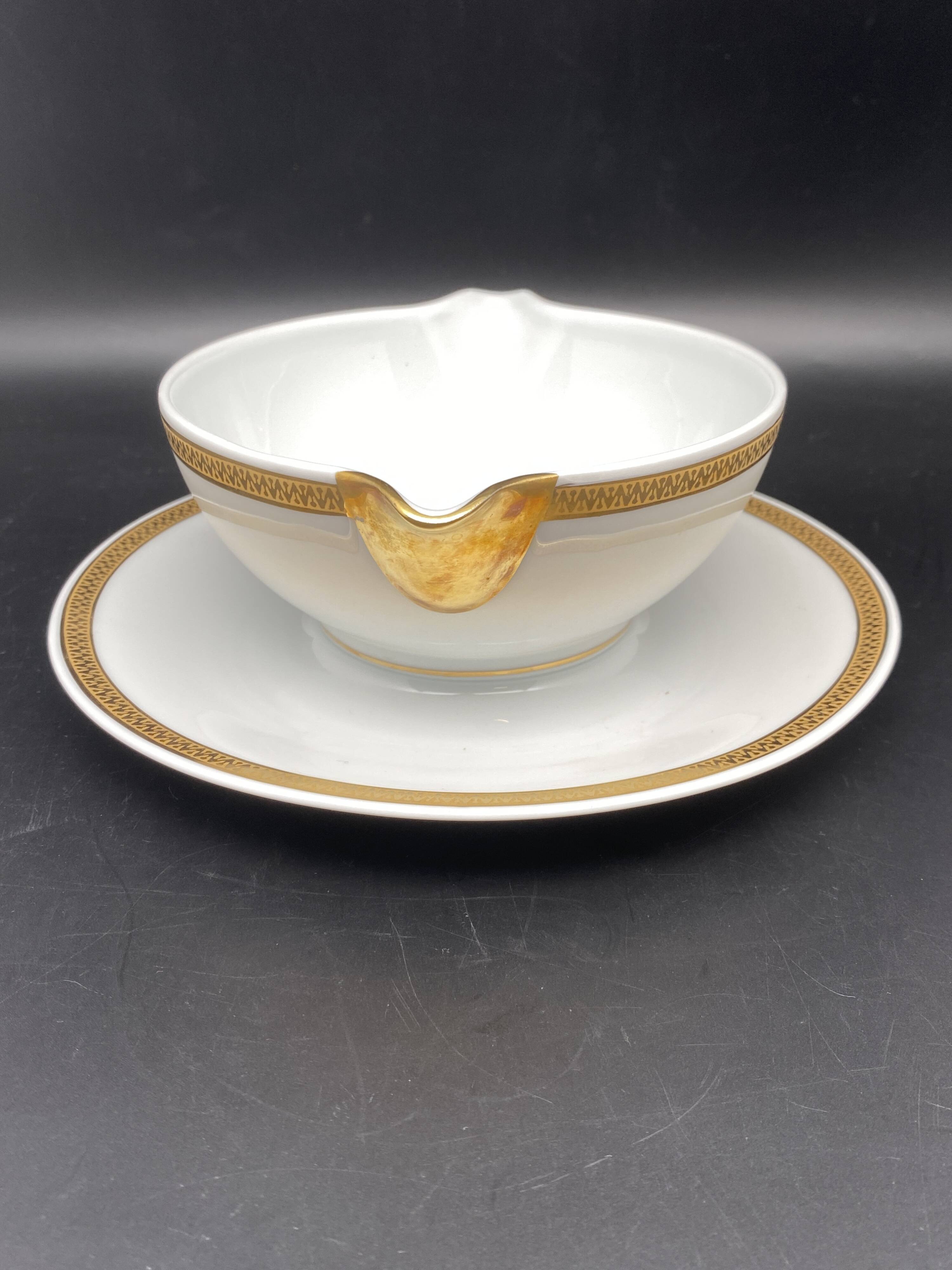 Limoges porcelain gravy boat with gold edging