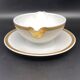 Limoges porcelain gravy boat with gold edging