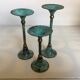 Set of candlesticks with green patina and brass Memphis