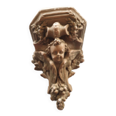 Old cherub plaster wall console
