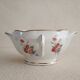 Lean fat sausage in Limoges porcelain