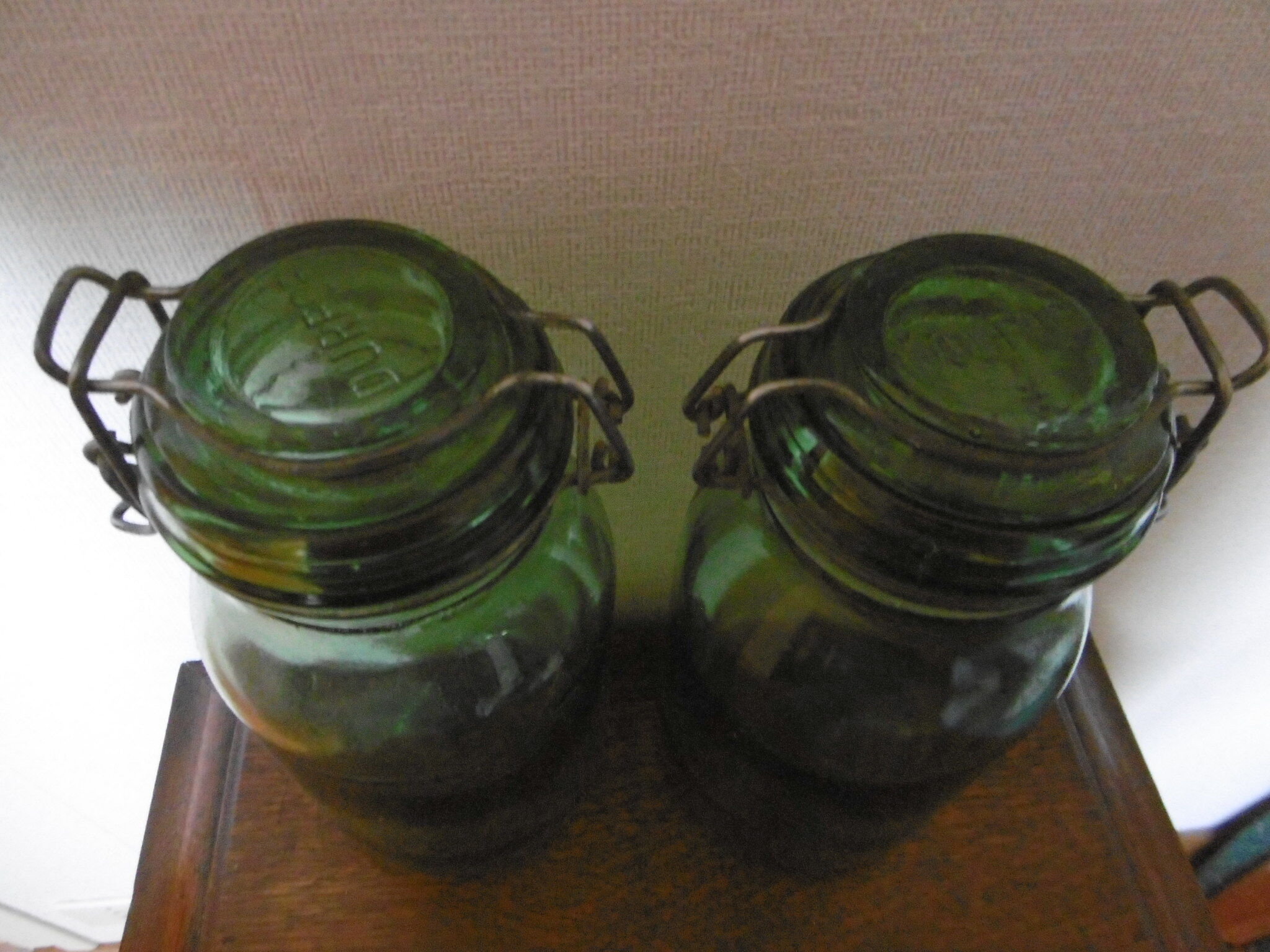 Lot of two old green jars