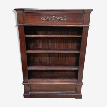 Open bookcase in solid mahogany and veneer, late 19th C.