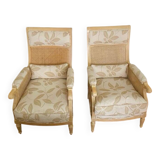 Paire de fauteuils cannés de style Louis XVI à décor floral