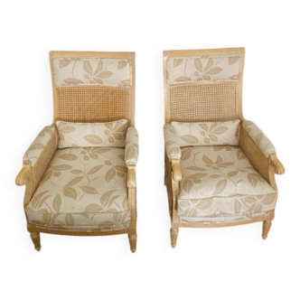 Paire de fauteuils cannés de style Louis XVI à décor floral