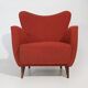 Pair of red armchairs with cone-shaped feet, 1950s