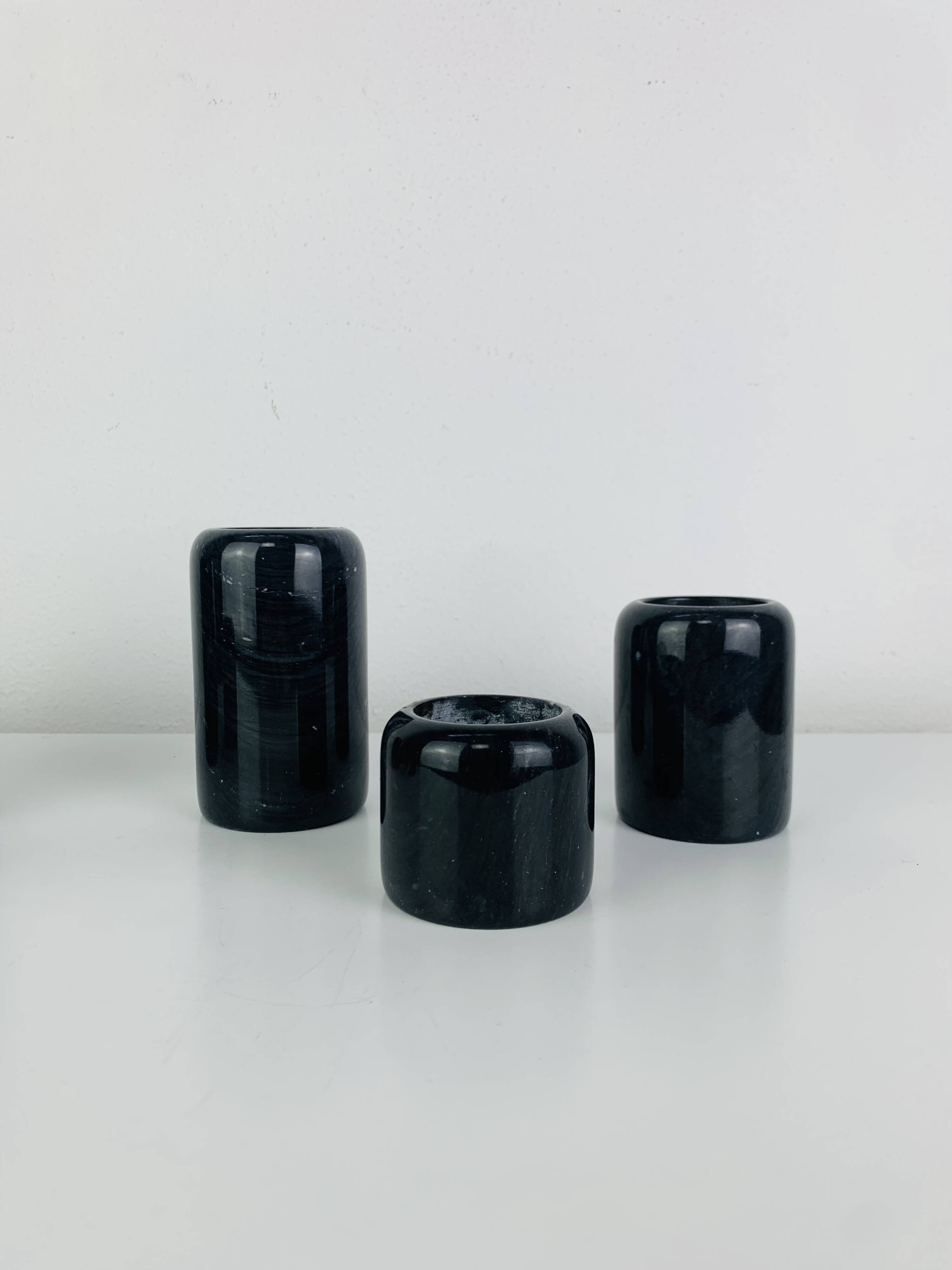 Vintage black marble candlestick trio