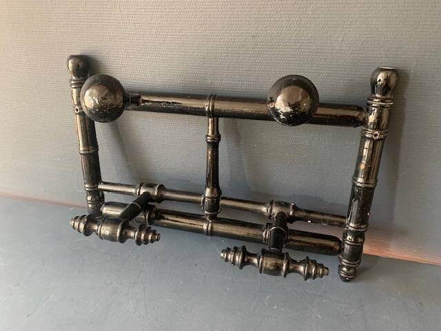 Wall-mounted coat rack in wood 1900