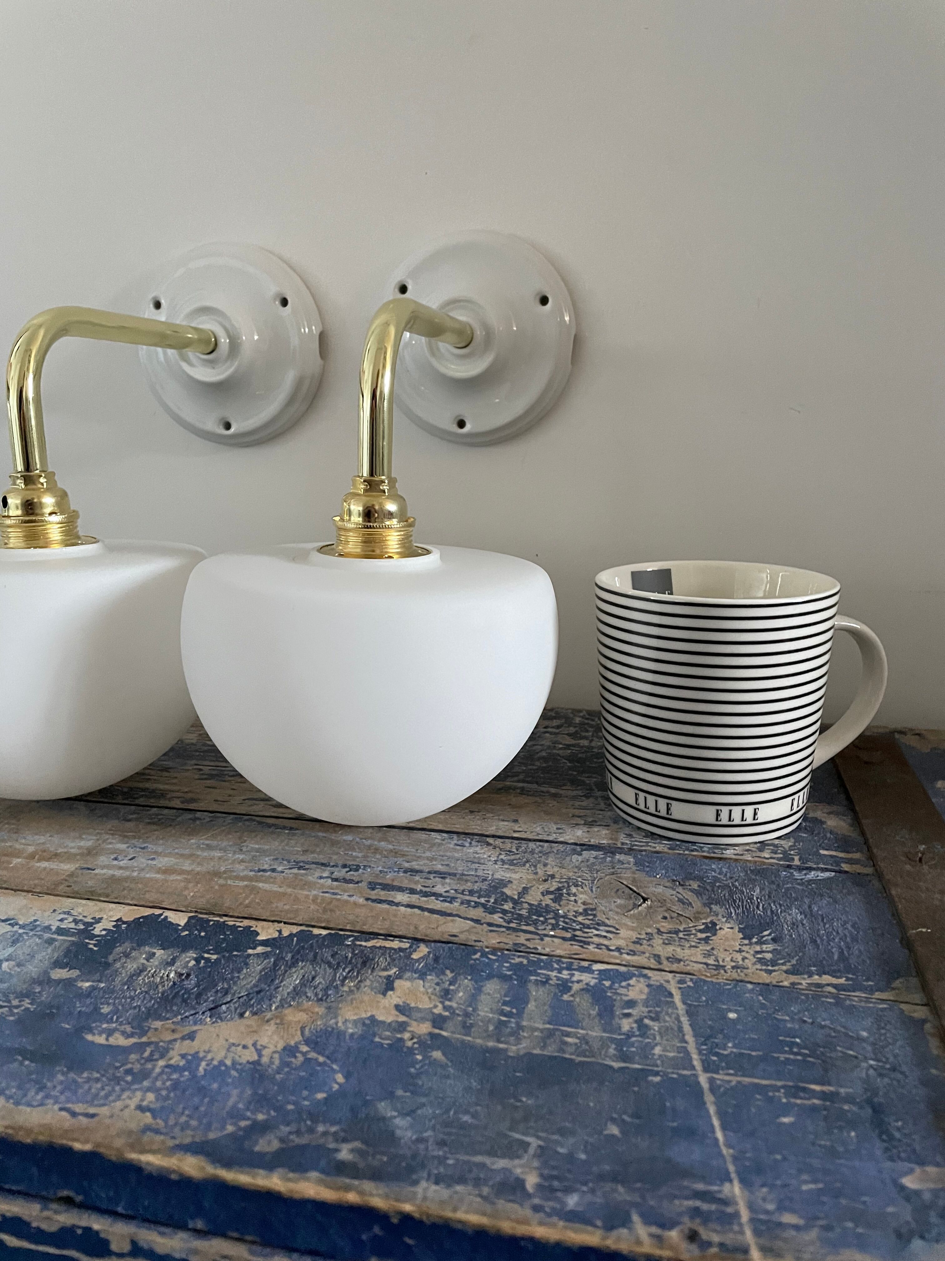 Set of two electrified white opaline wall lamps to nine