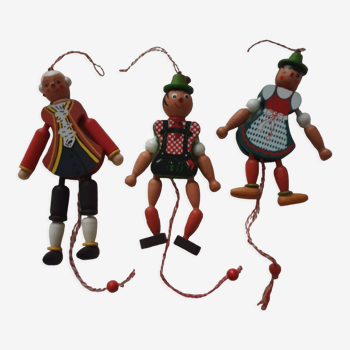 3 wooden articulated puppets