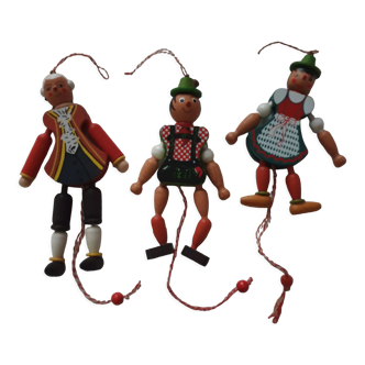 3 wooden articulated puppets