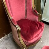 Fauteuil en bois doré et repose pieds