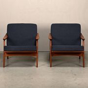 Pair Scandinavian Modern armchairs in teak and dark blue bouclé fabric