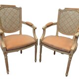Pair of Louis XVI style armchairs in 20th century patinated beech