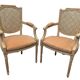 Pair of Louis XVI style armchairs in 20th century patinated beech