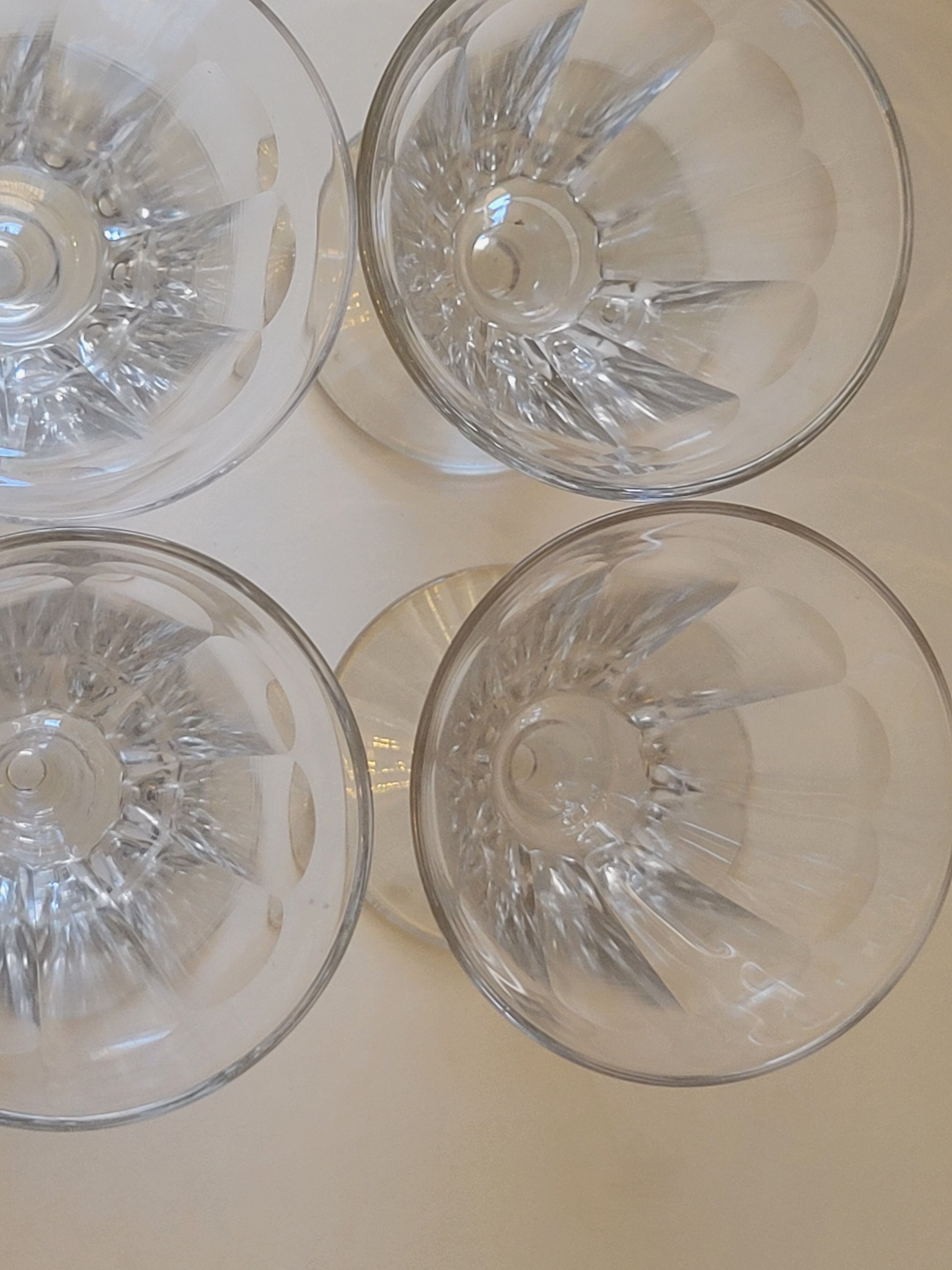 4 old conical liquor glasses cut with 10 flat ribs with faceted sides