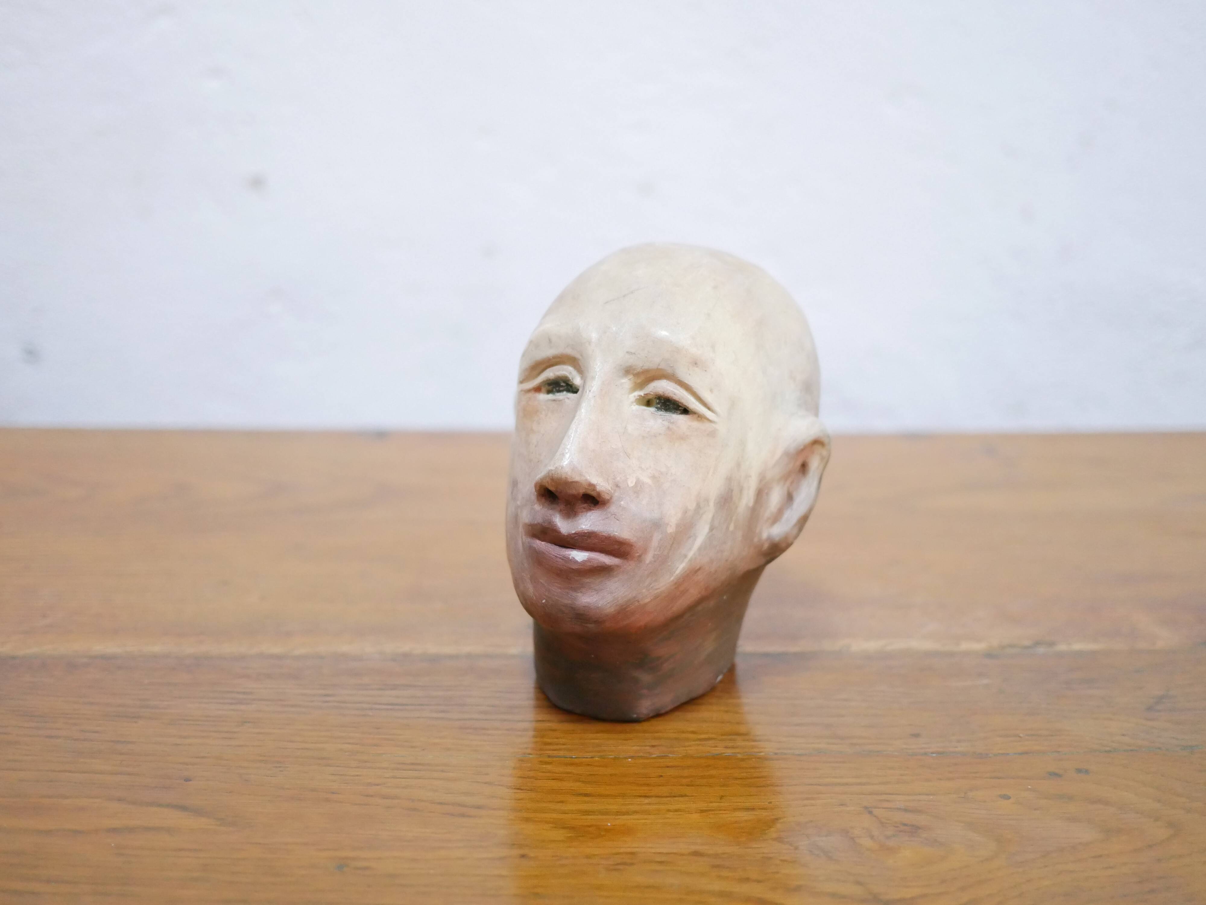 Terracotta head sculpture