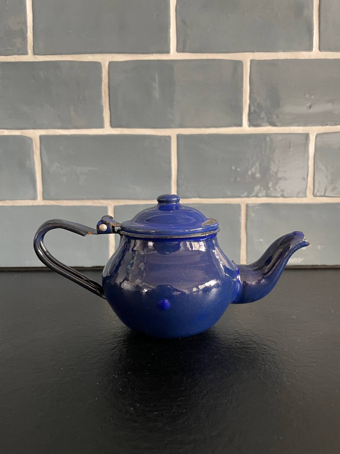 Mini blue enamelled sheet metal teapot
