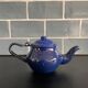 Mini blue enamelled sheet metal teapot