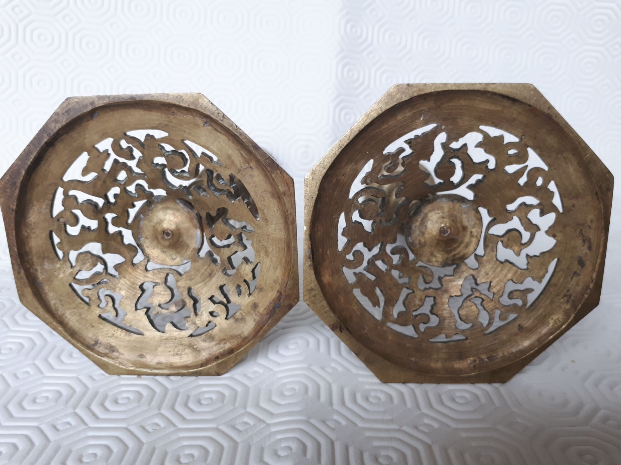 Pair of bronze candle holders