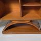 Mid-century modern mobile bar cabinet with sculptural base, 1950s.
