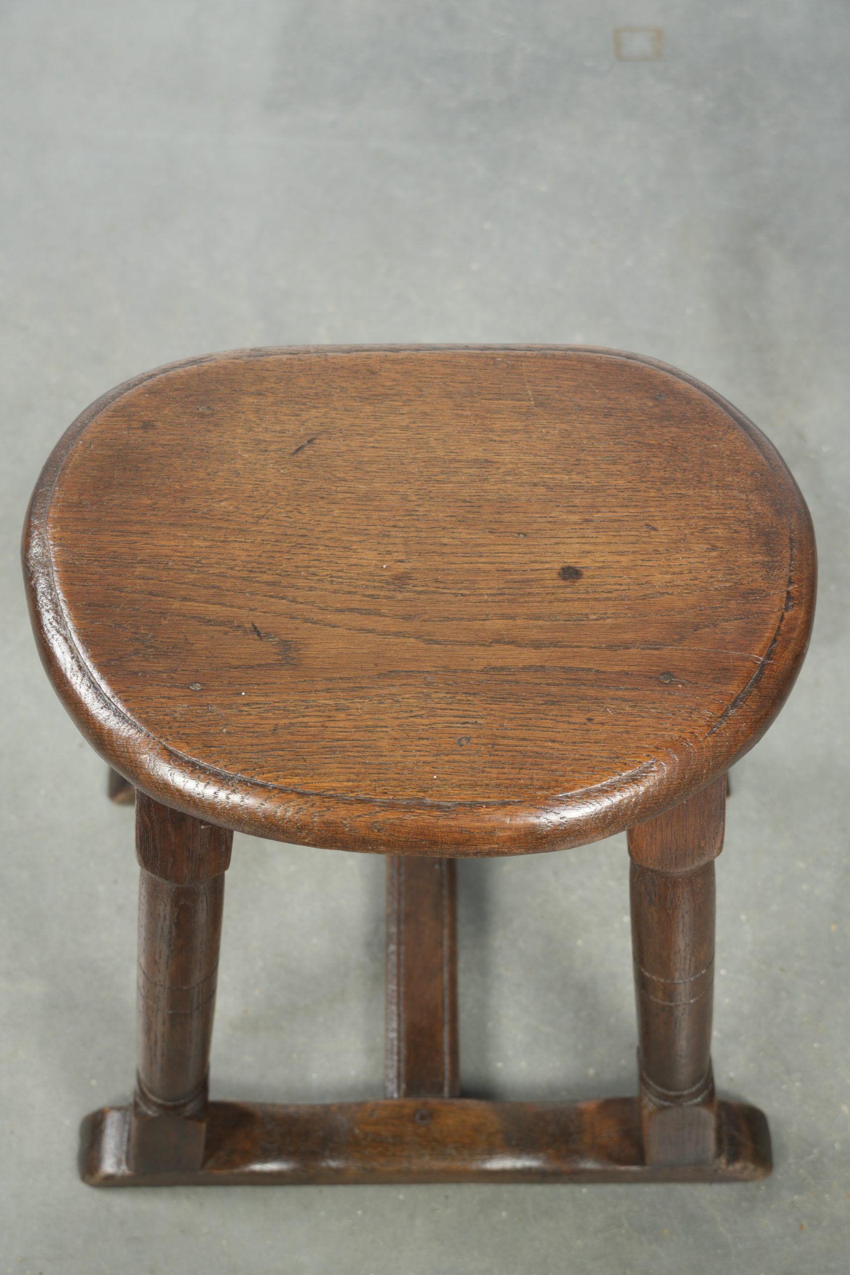Antique Dutch oak stool from the early 19th century with a nice design