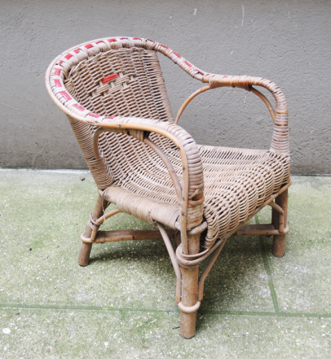 Desk with rattan and wicker armchair for children