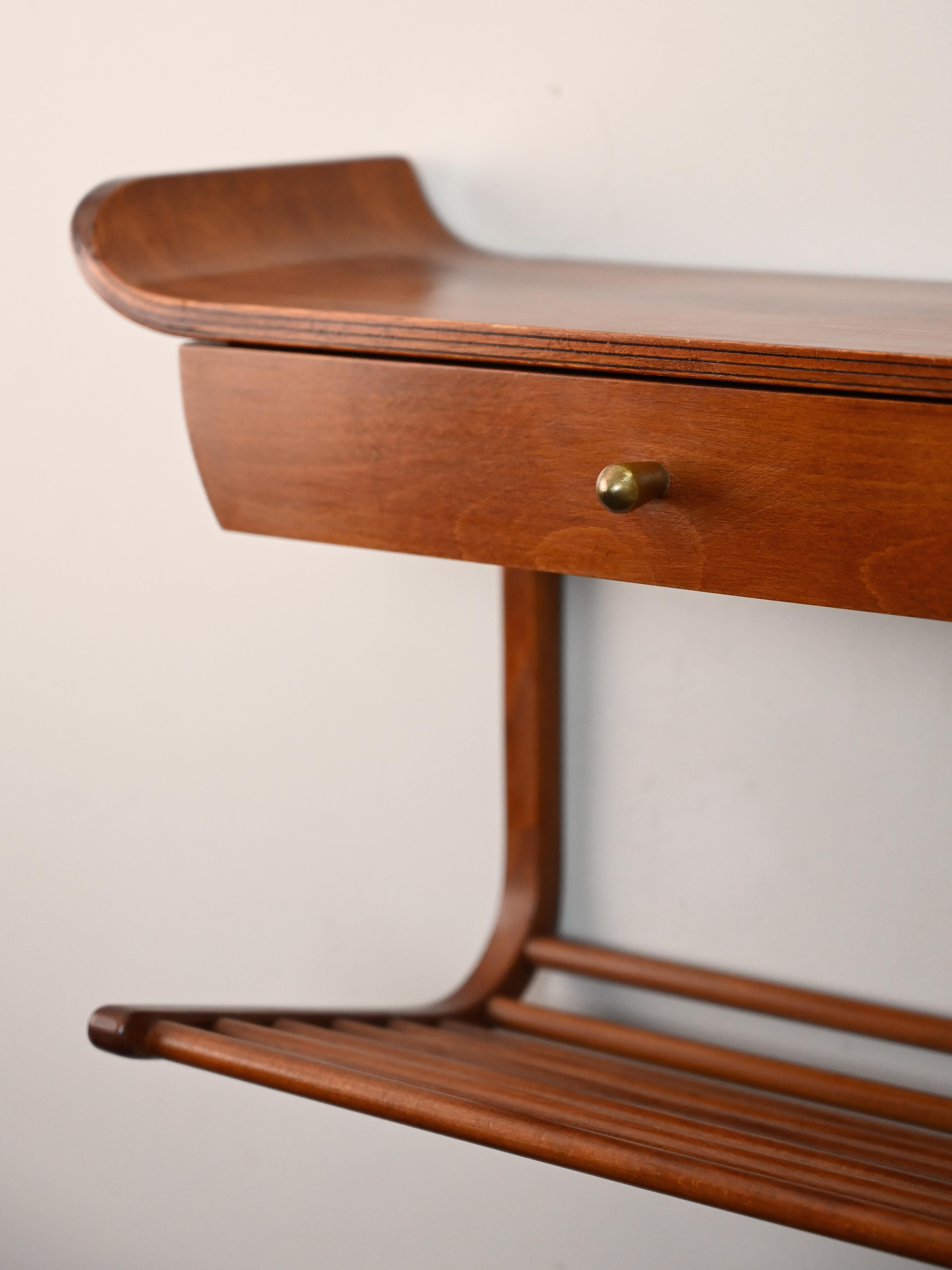 Suspended nightstand of 1960s modernism