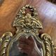Miroir au putto style Louis XV Rocaille en bronze doré