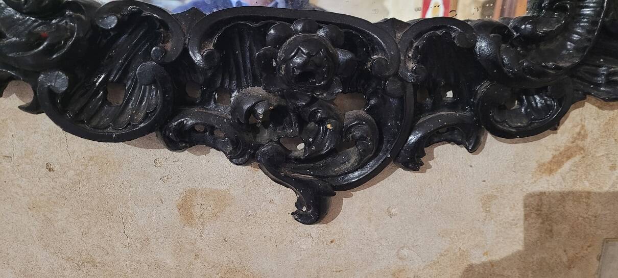 Mirror with carved wooden pediment, late 19th century