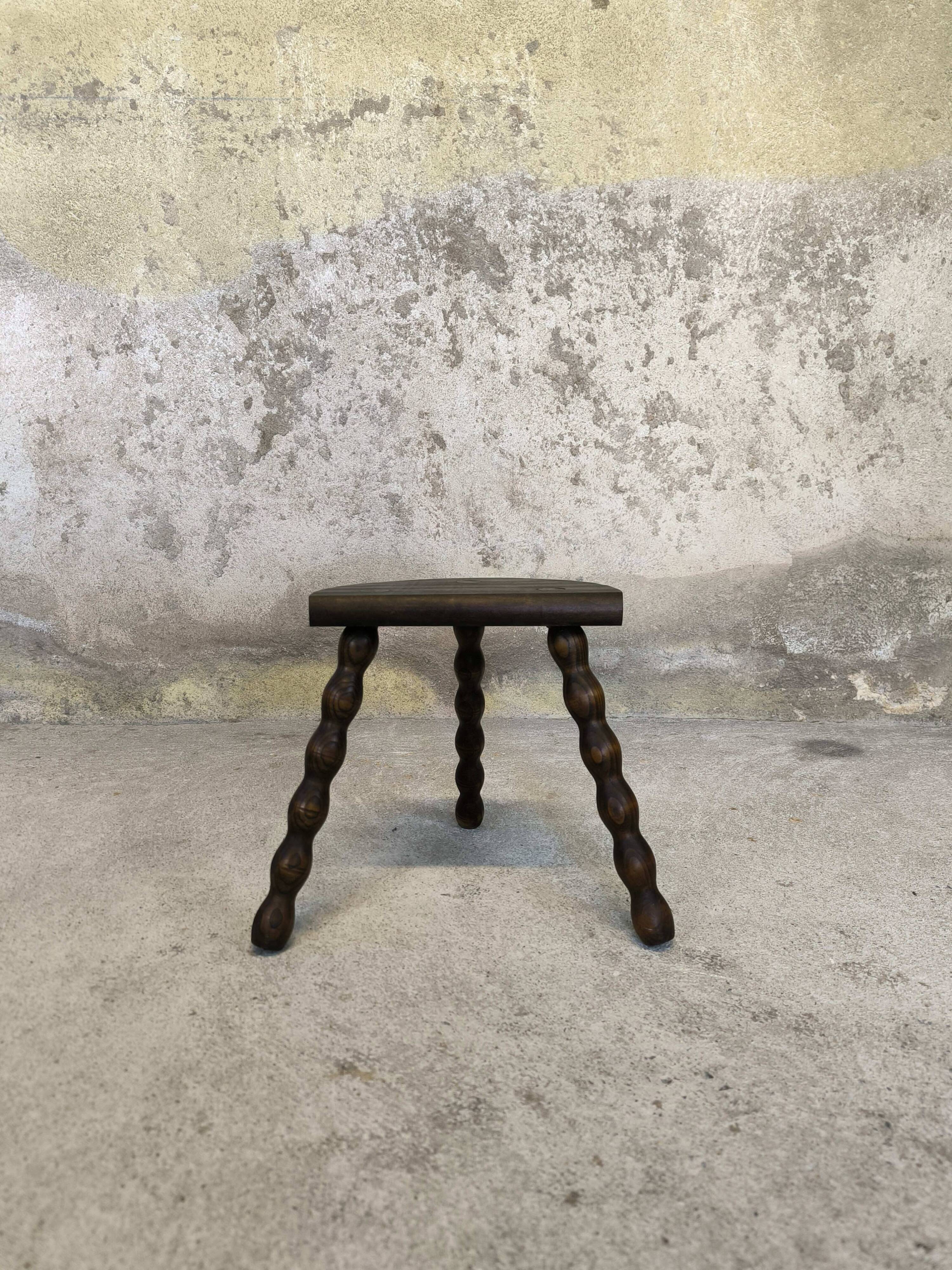 Vintage tripod stool with beaded legs