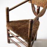 Hand carved brutalist  / folk 'Monk' chair, reupholstered in sheepskin, Swe