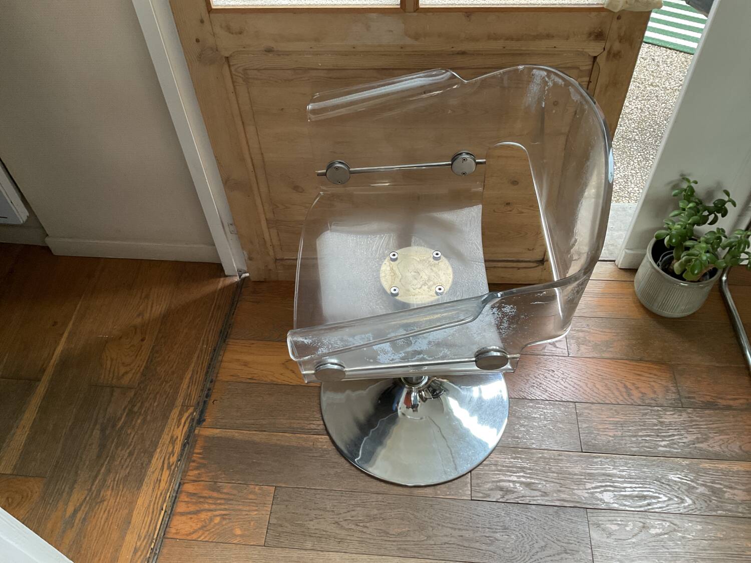 Plexiglas armchair with steel base from the 90s